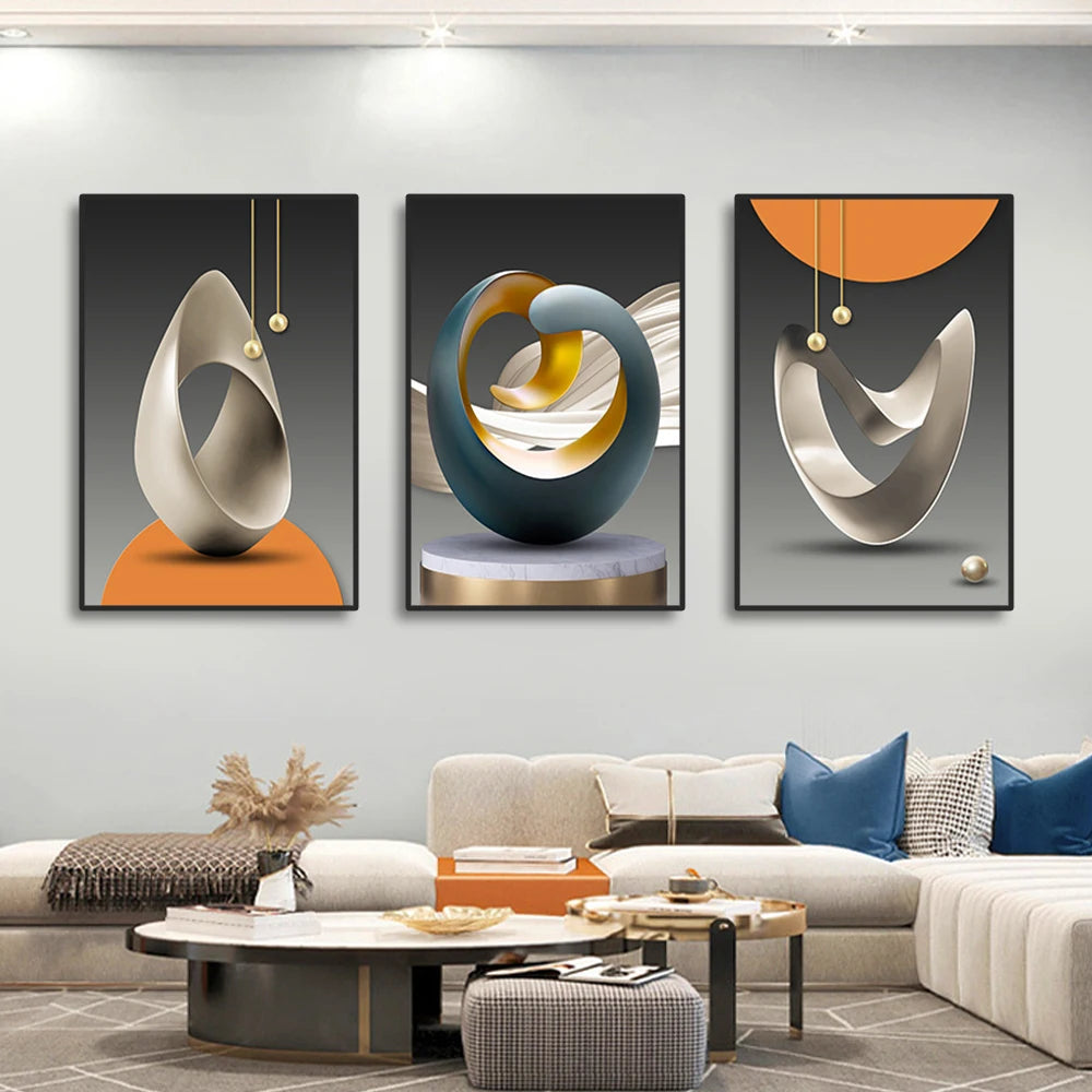 A set of three modern geometric canvas wall art pieces featuring abstract silver and blue tones displayed on a light gray wal