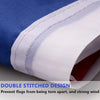 A close-up of a folded blue and white polyester flag with a double stitched design.