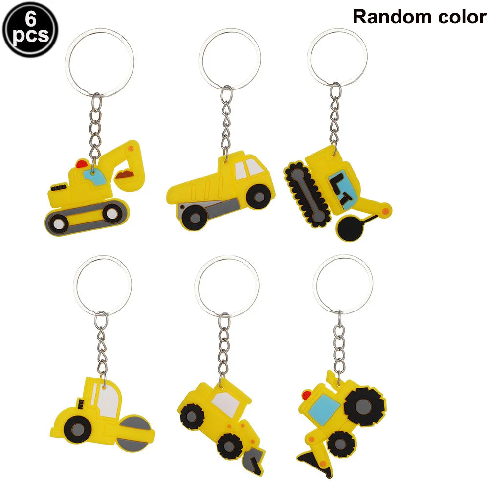 A set of six yellow construction vehicle themed keychains for a birthday party.