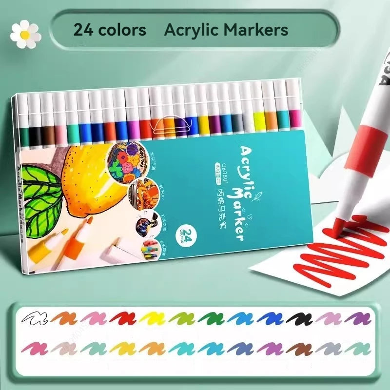A set of 24 colored acrylic markers displayed in a plastic case with a white sheet of paper.