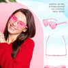 Pink heart-shaped rimless sunglasses shown on a woman, suitable for pool and beach parties.