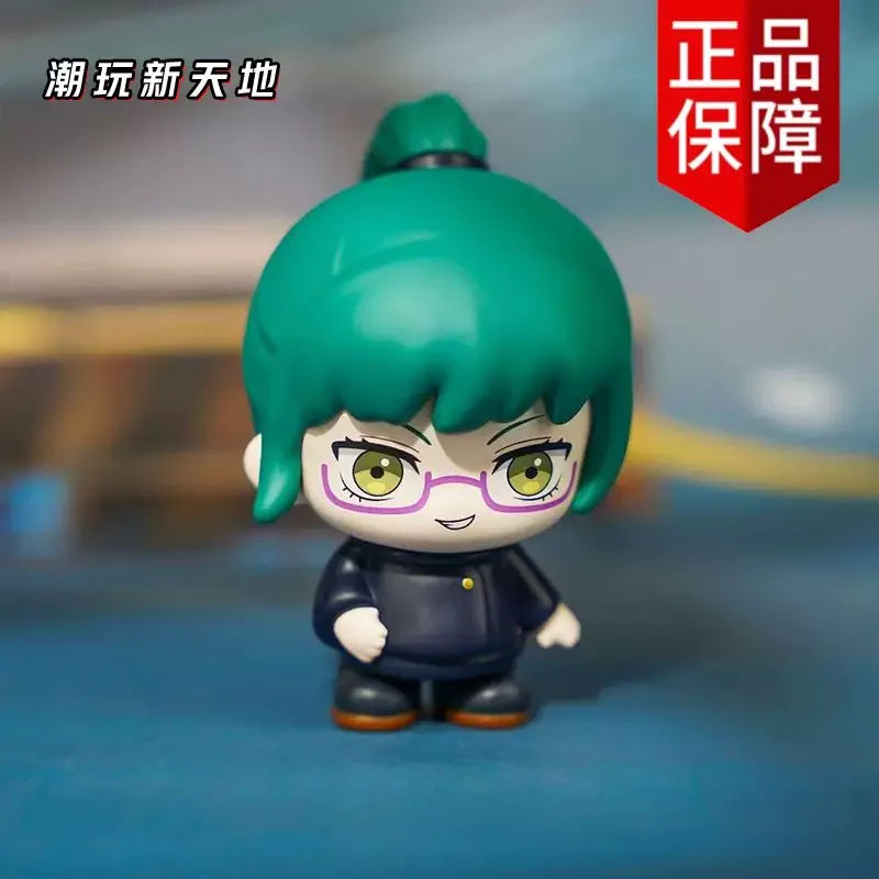 A blind box collectible figure of Gojo and Geto from Jujutsu Kaisen Season 2, featuring green hair and glasses.