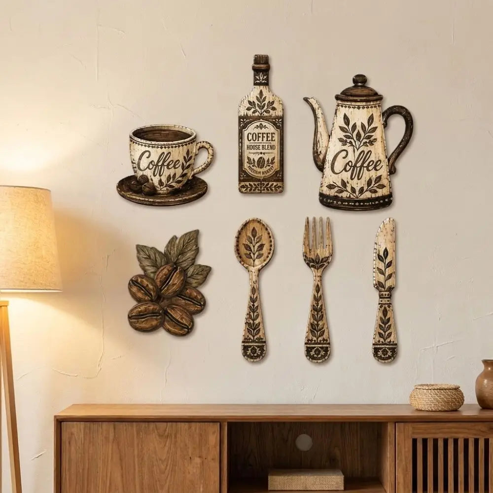 A collection of vintage wooden coffee utensils including a bottle, teapot, and various spoons and forks mounted on a wall.