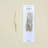 A package of 12 party candles with spiral design and star toppers.
