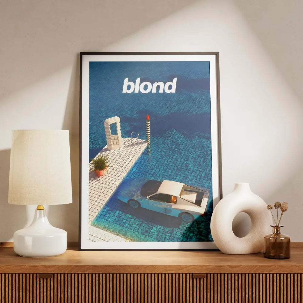 A canvas print featuring the word blond in white text against a blue ocean background with a white building and a red buoy.