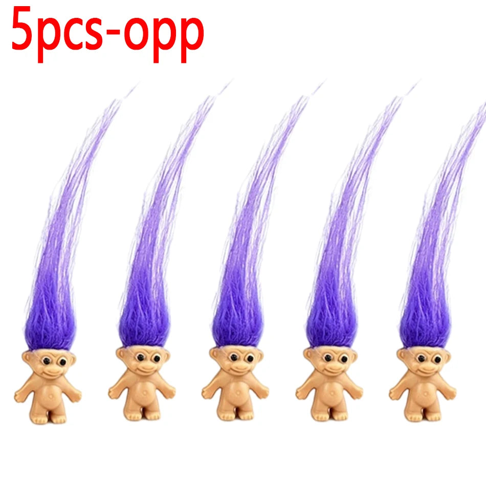 Five purple troll doll figures displayed side by side.