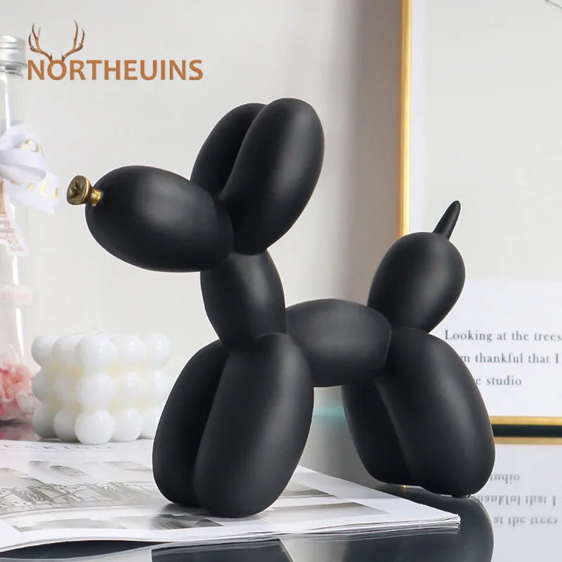 A black resin sculpture of a rabbit or hare, designed for modern home decor.