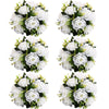 A set of six white rose ball centerpieces featuring silk artificial flowers and greenery.