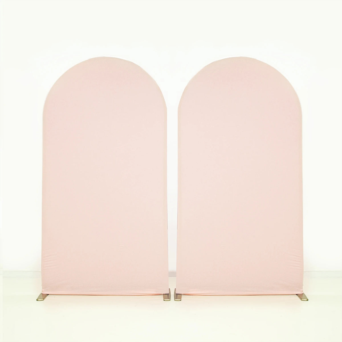 A seamless, pale pink stretchable arch backdrop cover used for party and event decoration.