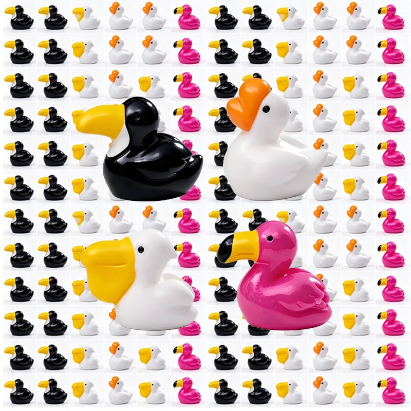Collection de petites sculptures animales en résine de différentes couleurs et formes pour un jardin féérique.