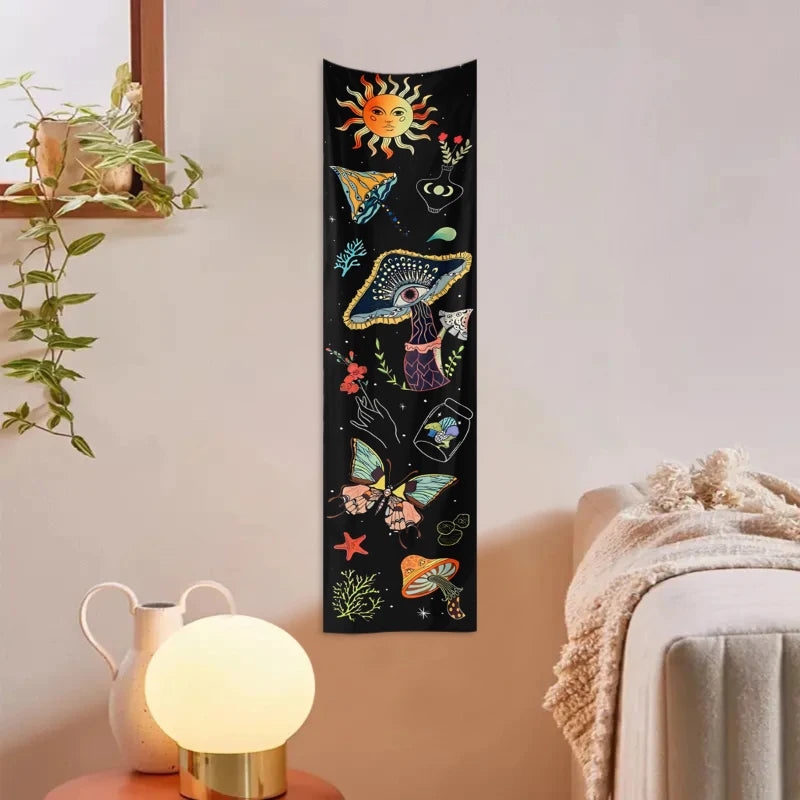A vertical tapestry featuring a dark background with celestial elements like a sun, moon, and galaxy, along with stylized mus