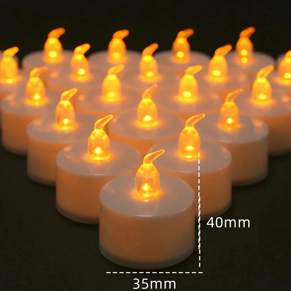 A row of glowing orange LED tea light candles in white holders, shown from above.