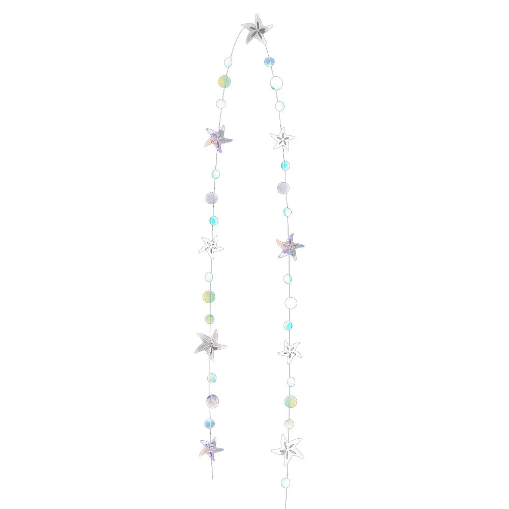 Iridescent mermaid and jellyfish party streamers featuring various star and circle shapes