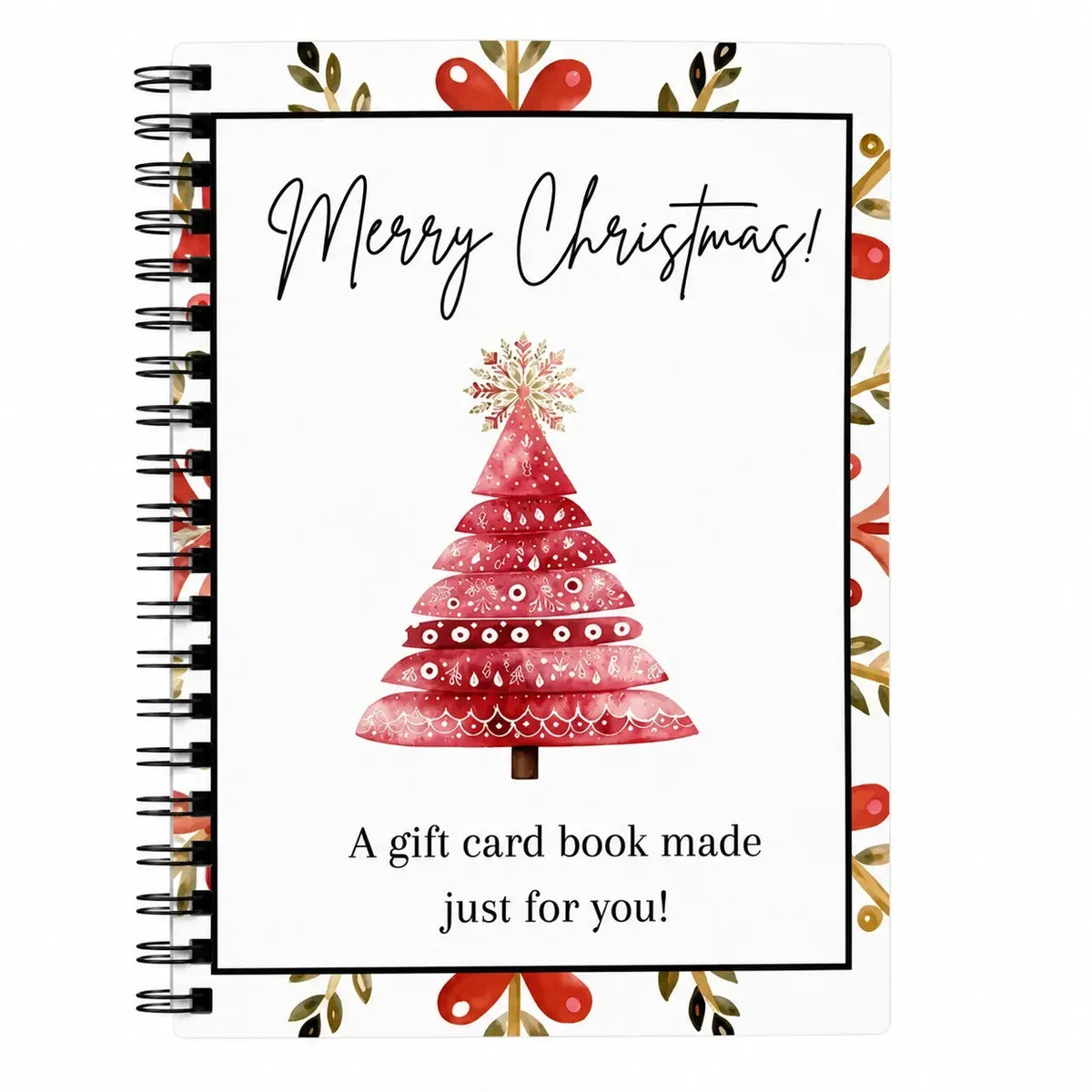 A greeting card book with a festive red Christmas tree design and holiday greenery.