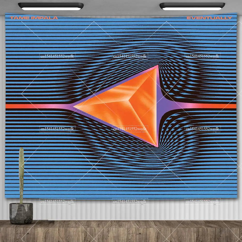 A vibrant blue tapestry wall hanging featuring an abstract orange geometric design with concentric black lines.