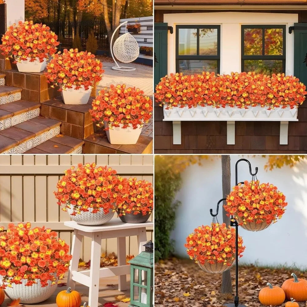A collection of bright orange and yellow artificial pansy flowers in various pots and hanging arrangements.