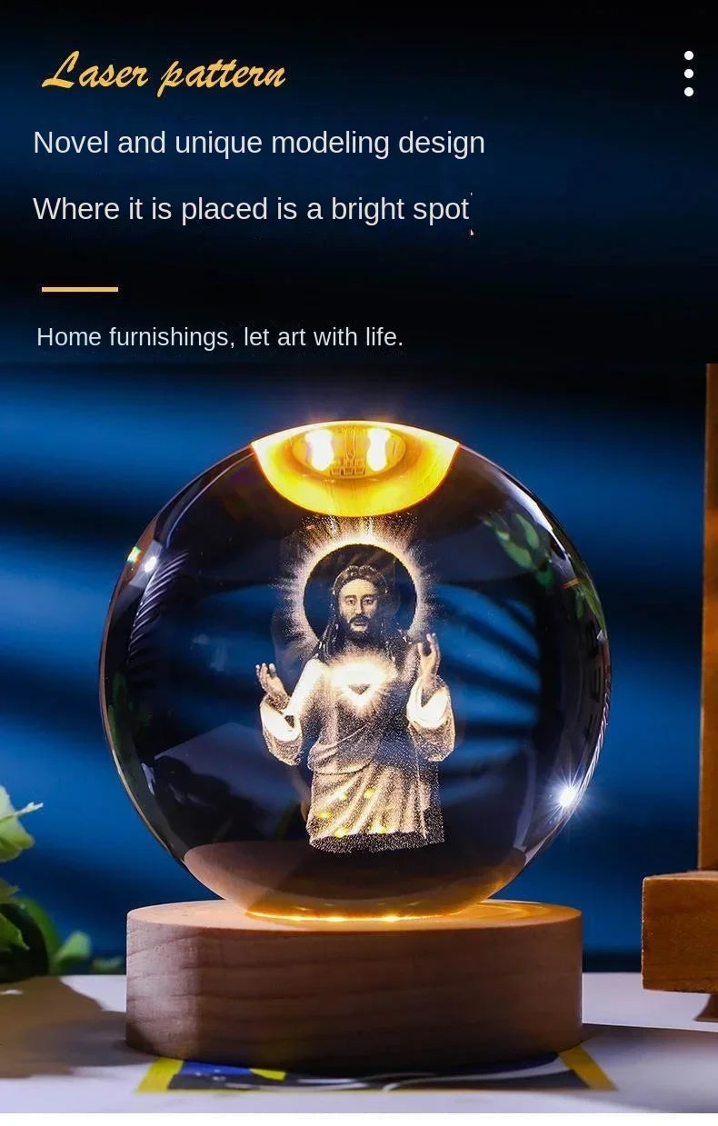 A glass crystal ball night light featuring a glowing depiction of Jesus Christ.