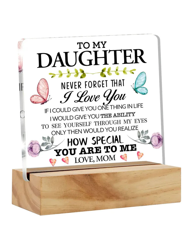 A personalized acrylic desk sign with the text Never Forget That I Love You and How Special You Are to Me Love Mom