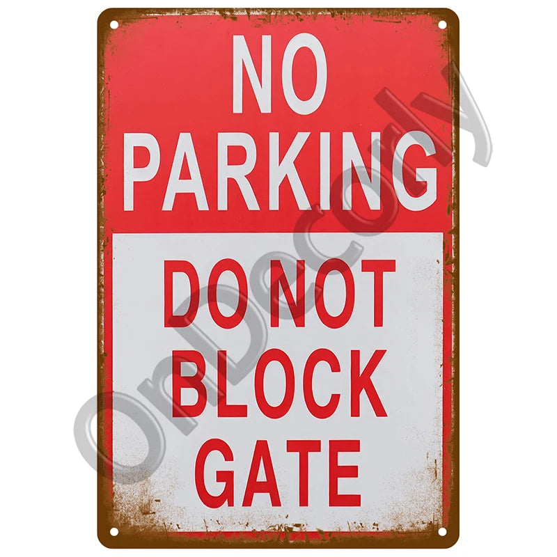 A vintage red and white metal sign with the text NO PARKING DO NOT BLOCK GATE.