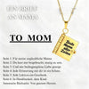 A gold pendant necklace shaped like an open book with text on it, featuring a message to mom.