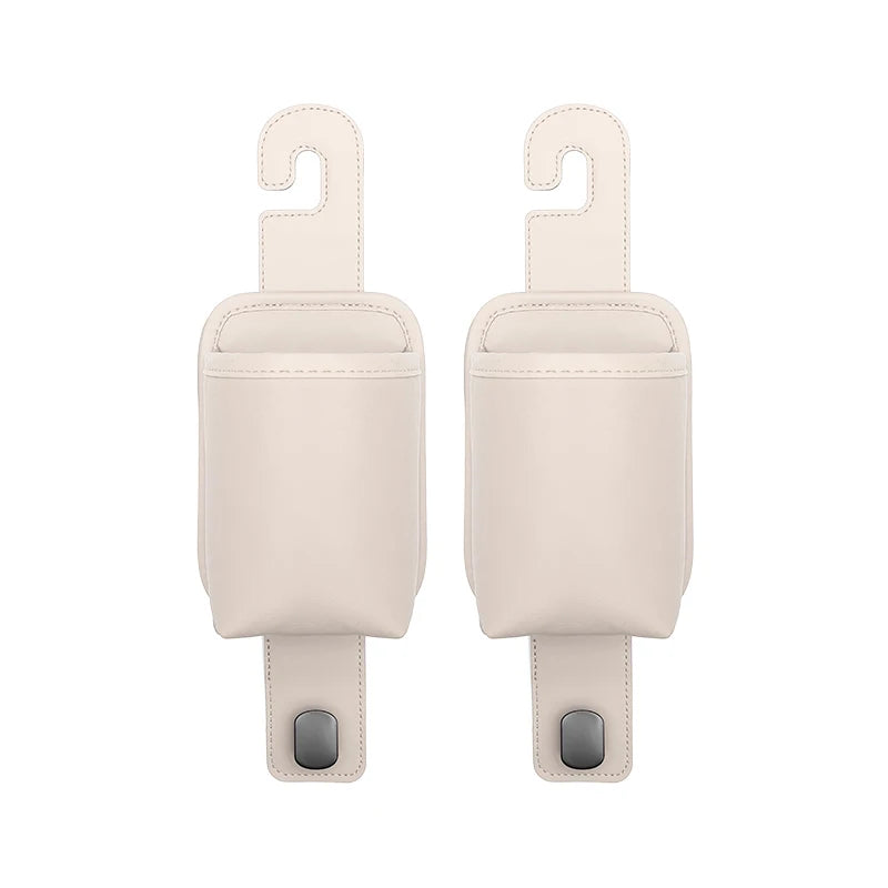 A pair of beige universal car seat back organizer and headrest hangers.