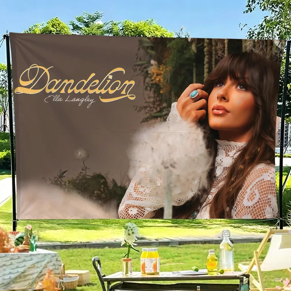 A woman with long brown hair wearing a white lace top is featured on a banner promoting Dandelion Ella Langley.