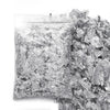 A pile of shiny gold foil flakes used for resin art and jewelry making.