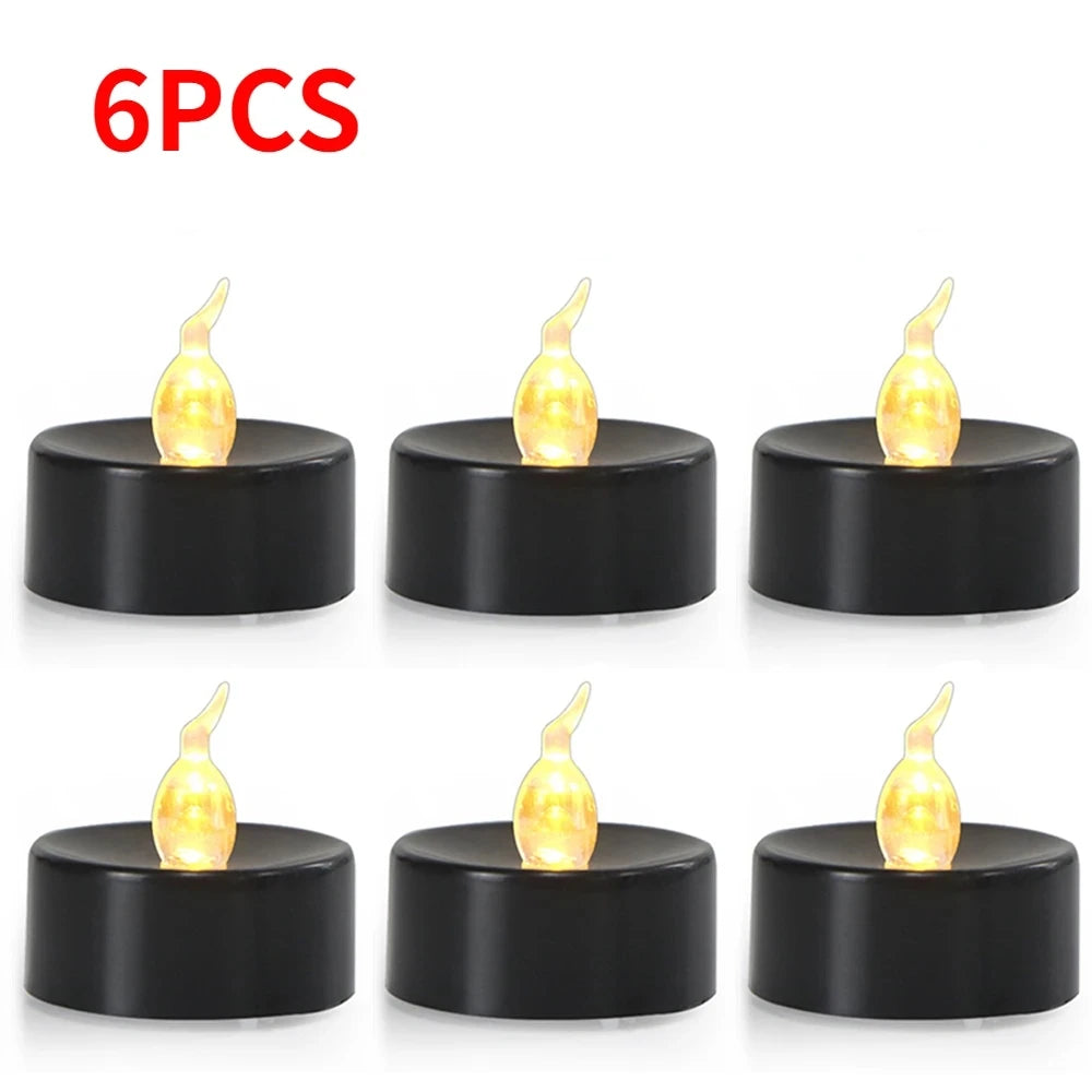Six pieces of black flameless LED candles with a warm white glow displayed on a white background.