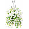 A hanging garland of white morning glory flowers and green eucalyptus leaves.