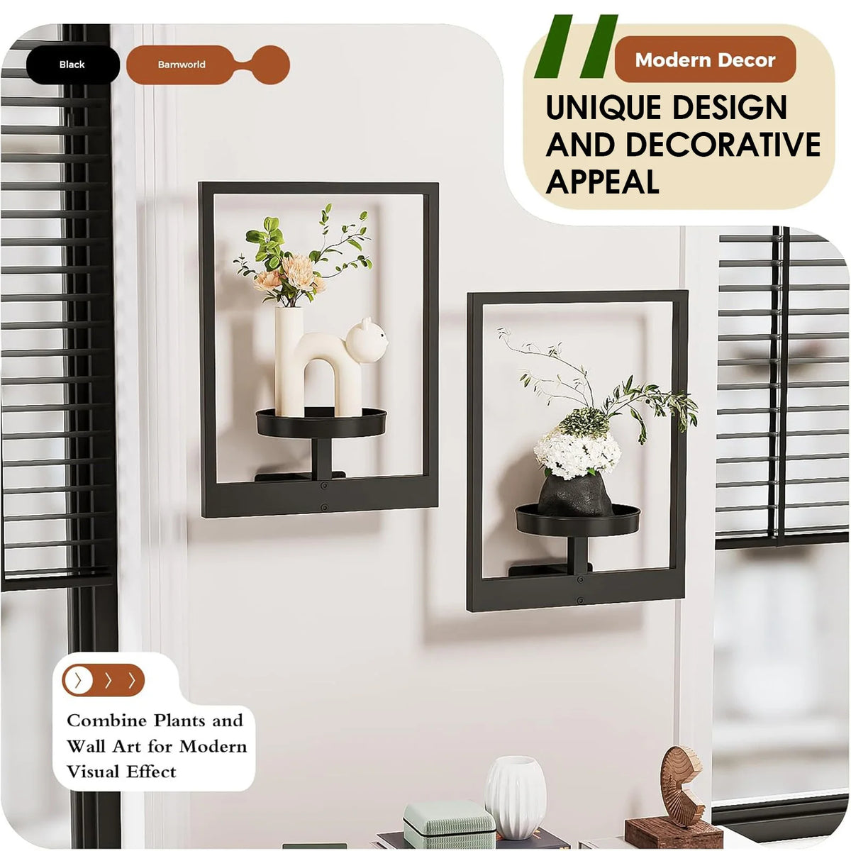 Modern black metal wall planters displaying greenery and white flowers on a light gray wall.