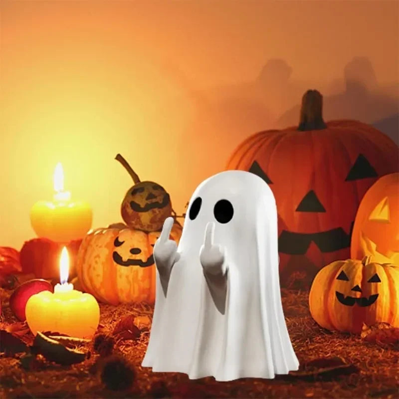 A white ghost figurine with a playful pose is placed among carved pumpkins in an autumn setting.