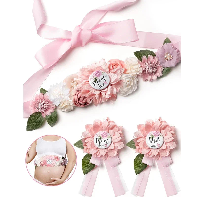 Pink floral maternity sash and corsage pin set for baby shower featuring roses and greenery