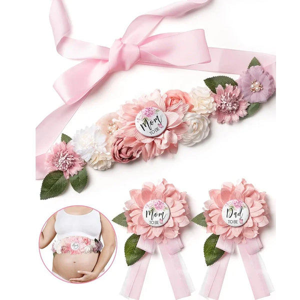 Pink floral maternity sash and corsage pin set for baby shower featuring roses and greenery