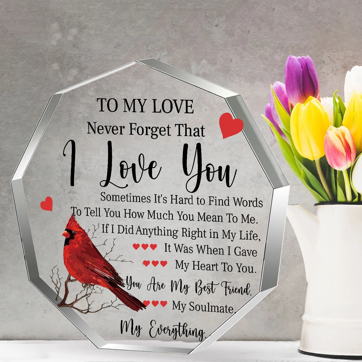 Klares Acrylhexagon mit der Gravur 'I Love You' und ähnlichen Botschaften.