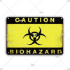 A yellow warning sign with black text that reads CAUTION and BIOHAZARD.