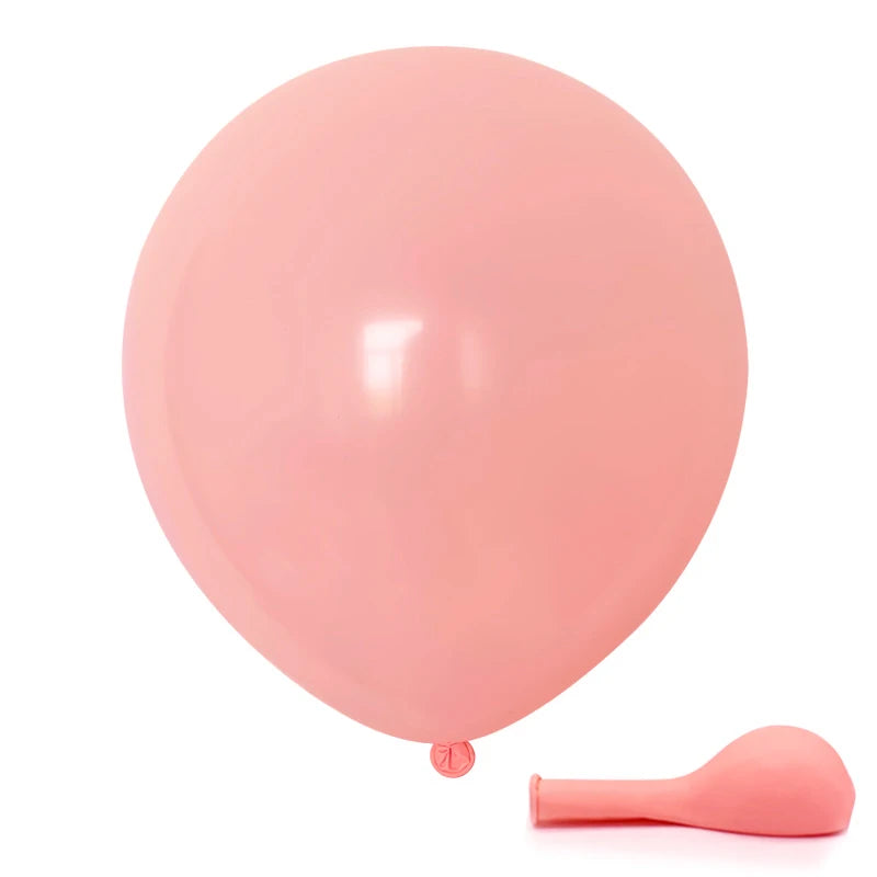 A single pink balloon and a pink spatula are shown against a white background.