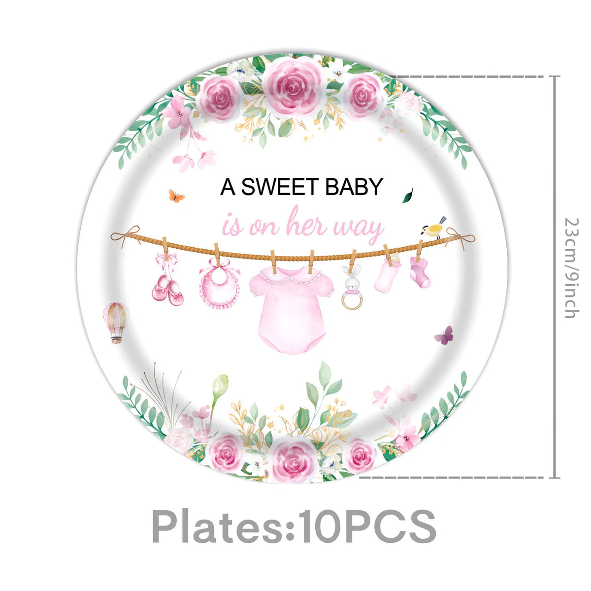 Pink floral plate decorated with a sweet baby theme featuring a baby bottle and pink clothing items
