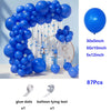 A collection of blue balloons in various sizes and a balloon tying tool are displayed on a white background.