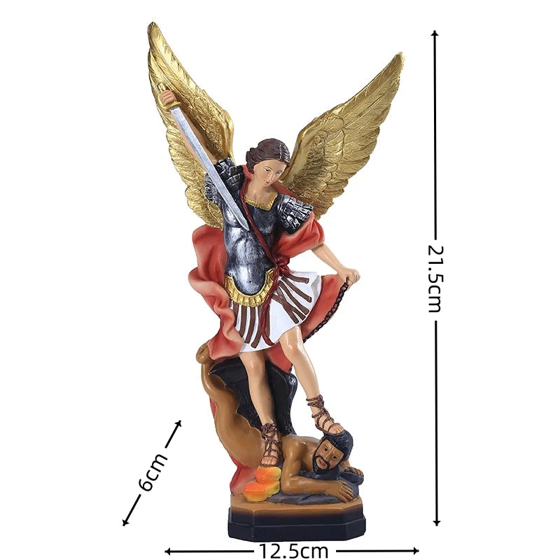 Bronzed Saint Michael Archangel resin figurine with golden wings and a figure lying below.