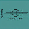 A diagram showing the dimensions of a metal prayer cross wall art piece, measuring 9cm/3.5in in height and 30cm/11.8in in wid