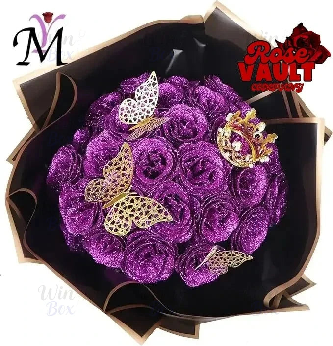 A bouquet of purple glitter artificial roses with gold butterfly accents displayed in a dark box.