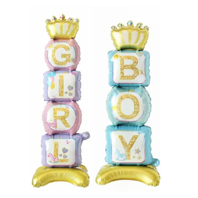 A stack of gold and light blue foil balloons shaped like letters spelling GIROBY