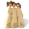 Three ceramic angel friendship statues in beige and cream colors standing side by side