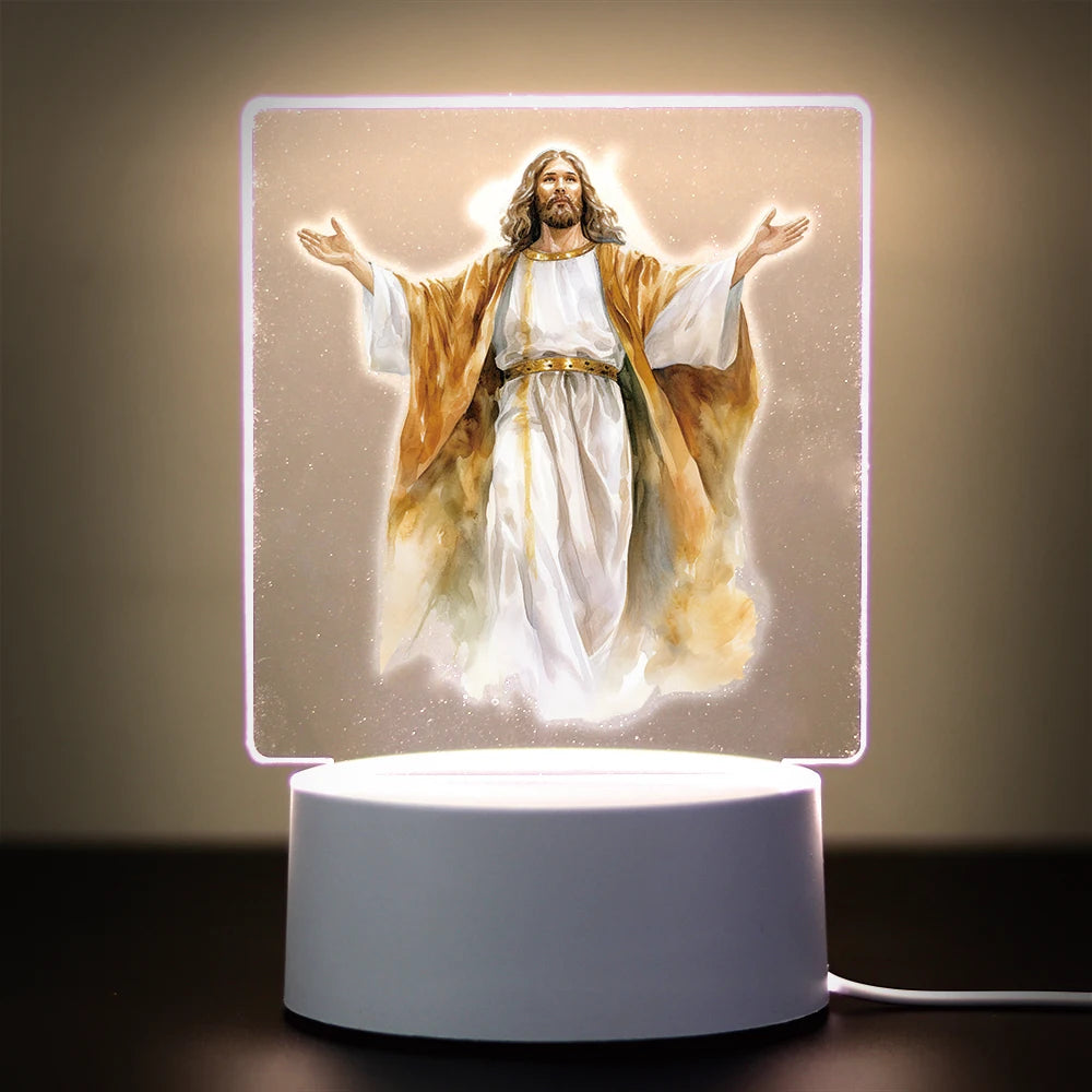 A 3D LED night light depicting Jesus Christ with outstretched arms, illuminated against a soft background.