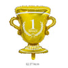 A golden foil trophy balloon with a laurel wreath and the number 1 winner displayed on it.