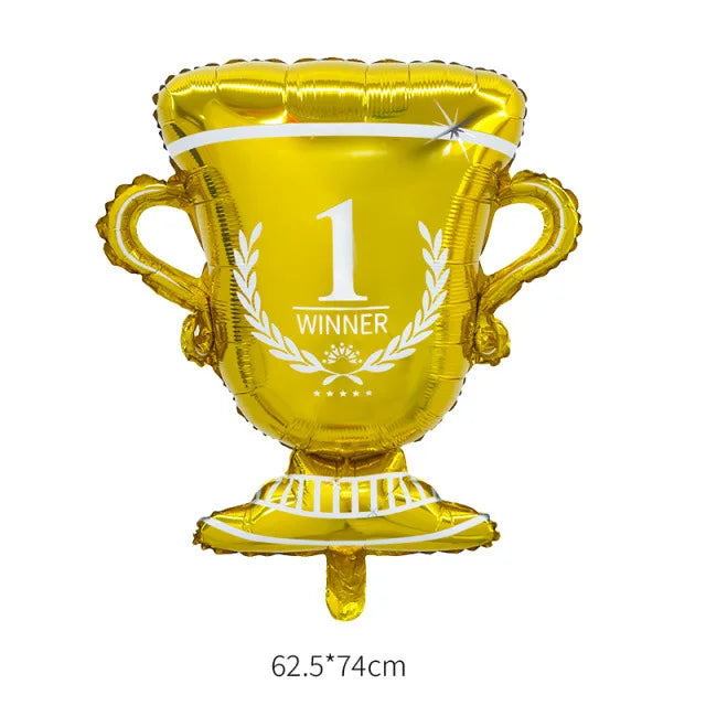 A golden foil trophy balloon with a laurel wreath and the number 1 winner displayed on it.