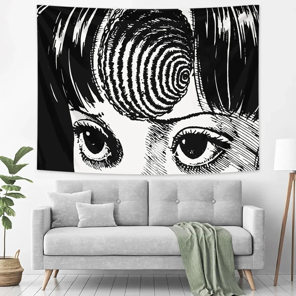A black and white tapestry featuring a stylized, intense eye design inspired by Junji Ito manga.