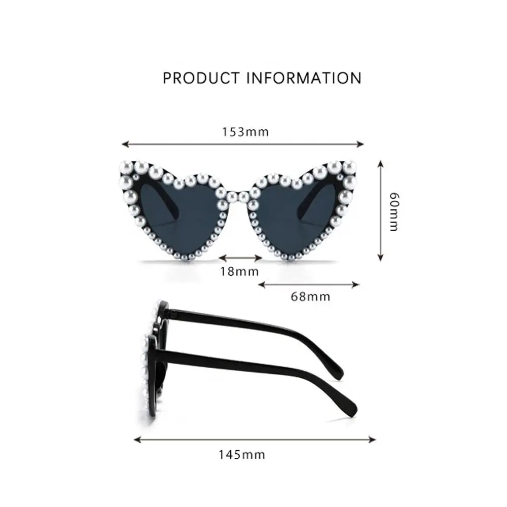 A pair of black heart-shaped sunglasses embellished with pearls, shown with various dimensions.