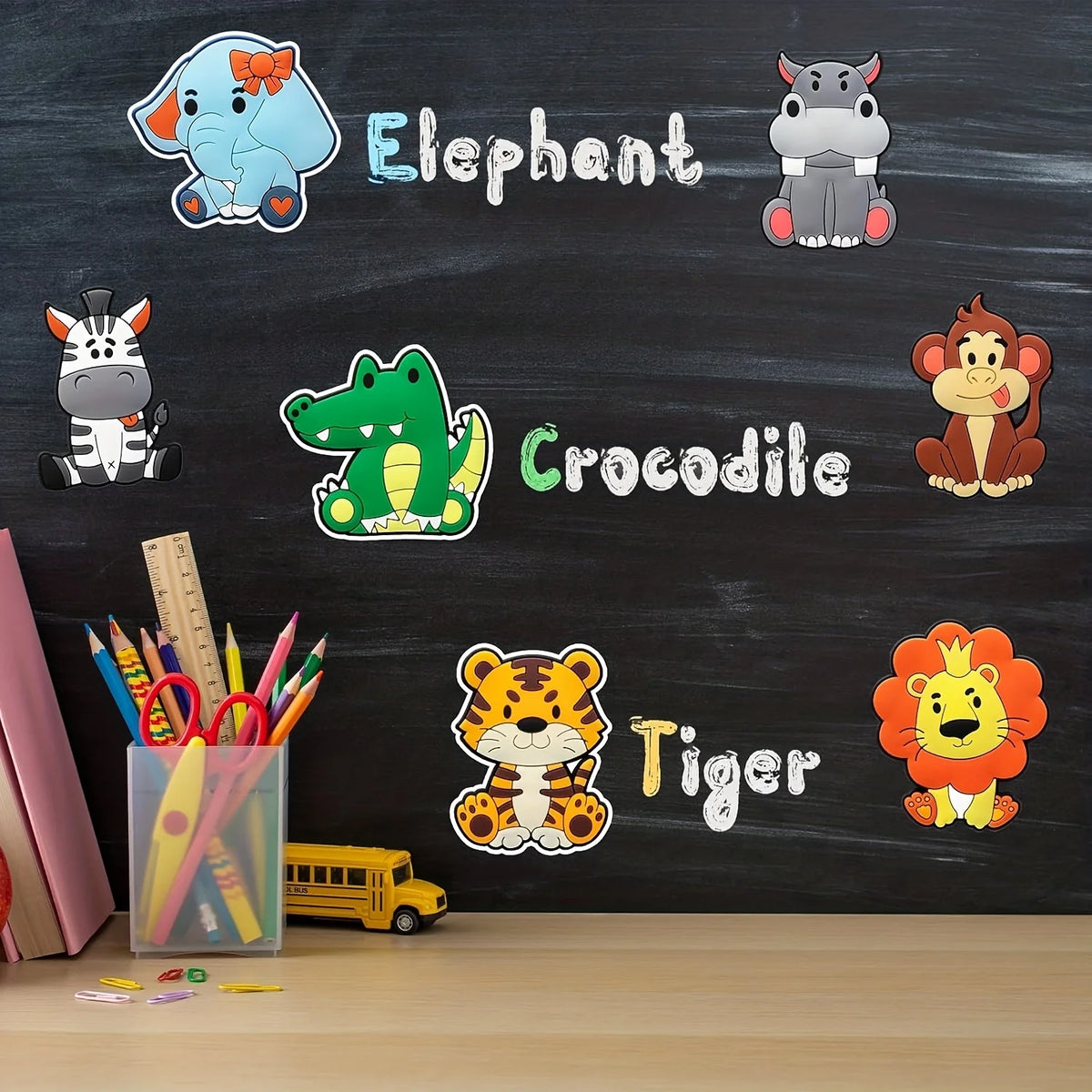 A chalkboard display featuring illustrations of an elephant, crocodile, tiger, and other cartoon animals.
