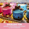 A tray of round disposable cake plates featuring pink and blue polka dots with chocolate frosting details.